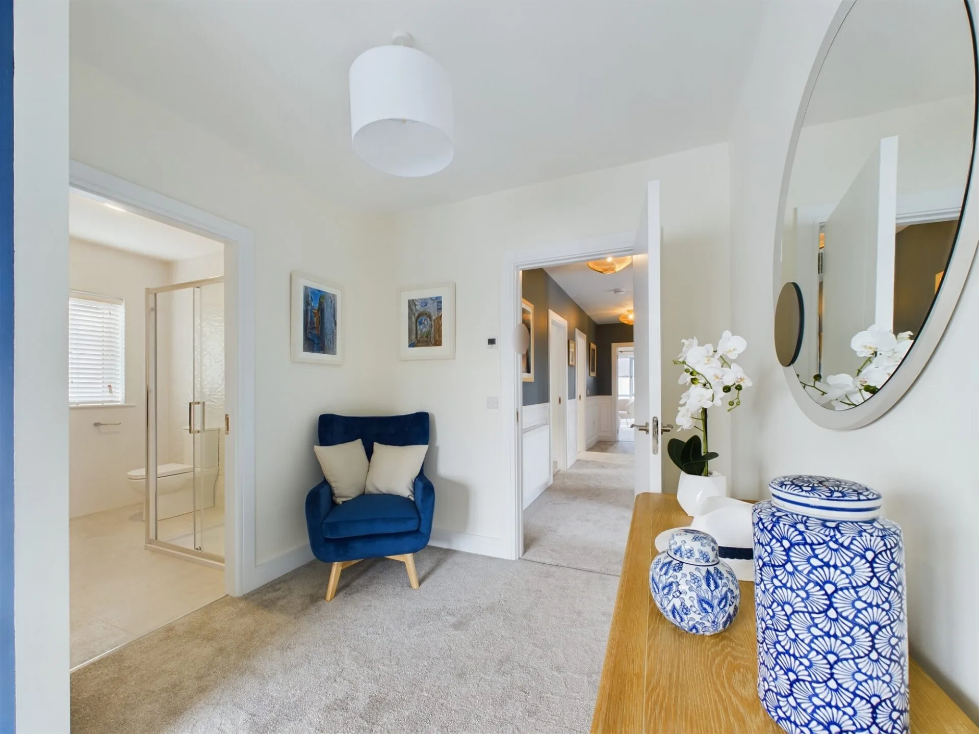 A bright home with blue furniture and artwork